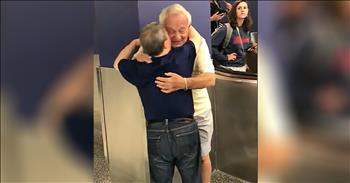 Man With Down Syndrome Reunites With Dad At Airport