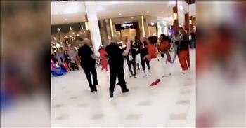 Police Officers Start To Break Up Flash Mob But Then Join In