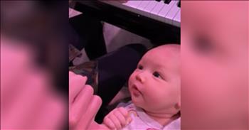 Couple Sings ‘I Want To Hold Your Hand’ To Infant Baby