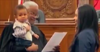 Caring Judge Helps Calm A Fussy Baby