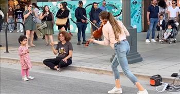 Little Girl Jumps In During Violinist’s Street Performance