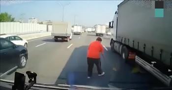 Truck Driver Stops In The Middle Of Traffic To Save Baby Kitten In The Road