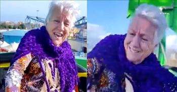 86-Year-Old Granny Hilariously Hangs On During Amusement Park Ride