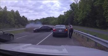 Police Officer Must Have A Guardian Angel On His Side After Car Almost Barrels Into Him