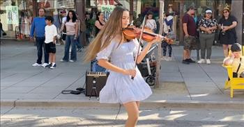 Toddler Steals The Show As Street Violinist Plays ‘Total Eclipse Of The Heart’